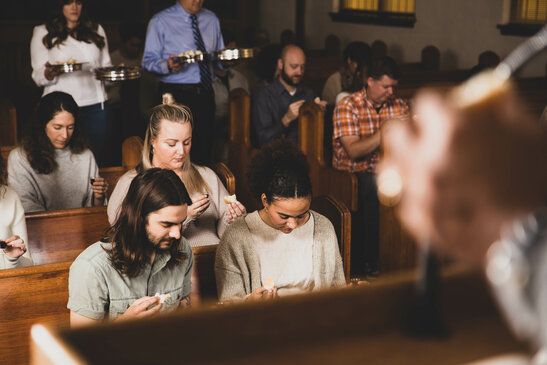 Congregation Praying Together Before Communion