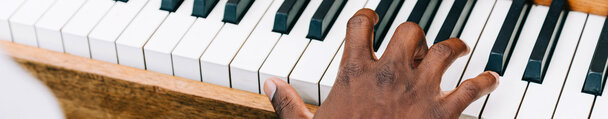 Hands Playing the Piano