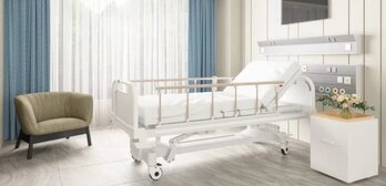 Bed In The Center Of A-Pristinely Clean Hospital Room-696X336