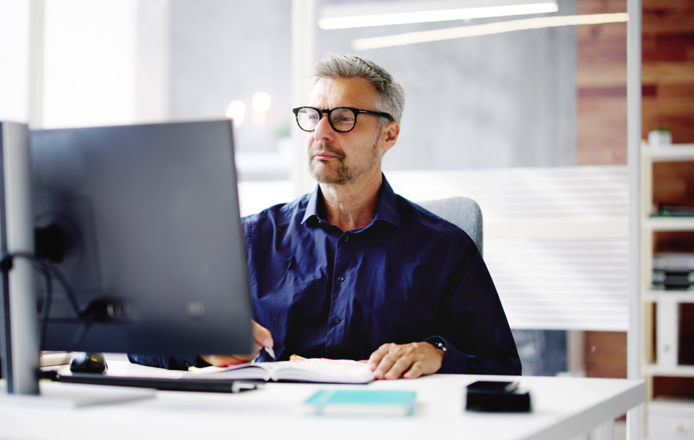 Man in front of a computer