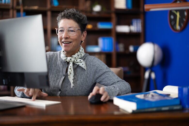 Woman using a desktop computer