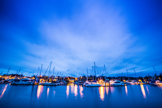 Sailboats in the moonlight.