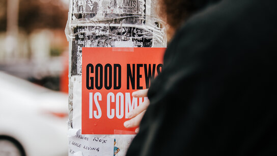 Good News is Coming Poster in the City