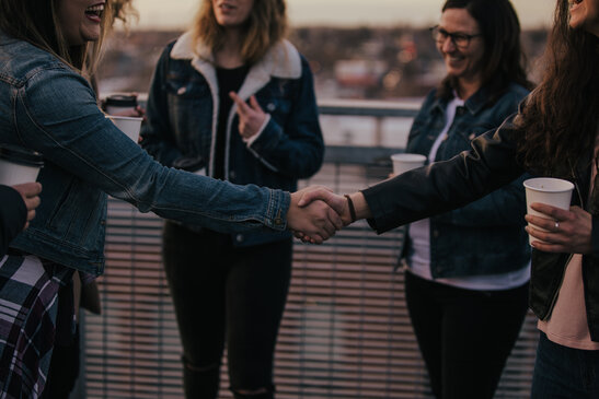 Women Shaking Hands