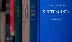 An image of the spine of several books on the Septuagint