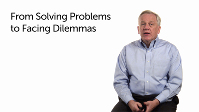 A Shift from Solving Problems to Facing Dilemmas