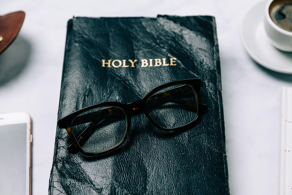 Glasses on a Bible large preview