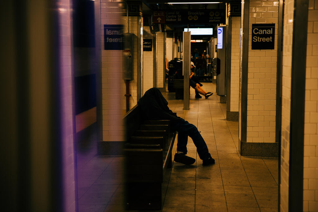 Homeless Man in Subway Station large preview