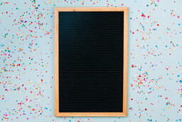 Letterboard Surrounded by Confetti  image 1