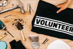 Hand Grabbing a Volunteer Shirt  image 1