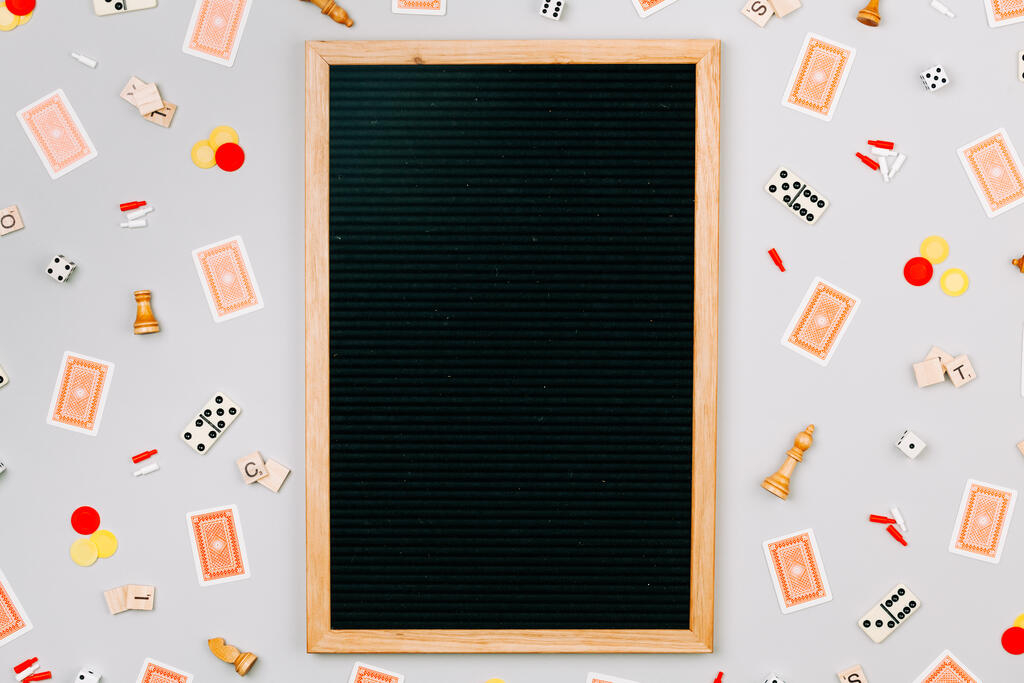 Letterboard Surrounded by Game Pieces large preview