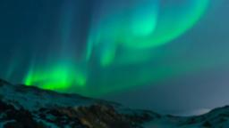 Aurora Borealis Over Mountains  PowerPoint image 2
