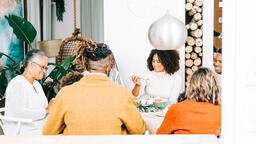 Family Enjoying Thanksgiving Dessert Together  image 1