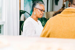 Grandmother Engaged in Conversation at the Thanksgiving Table  image 2