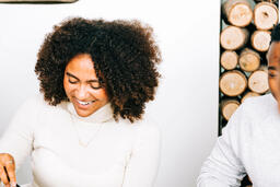 Woman Laughing at the Thanksgiving Table  image 1