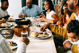 Family Enjoying the Thanksgiving Meal Together  image 1