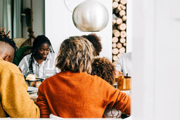 Family Praying Together Before the Thanksgiving Meal  image 1