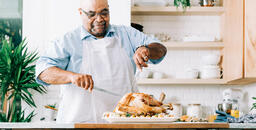 Man Carving the Thanksgiving Turkey  image 2