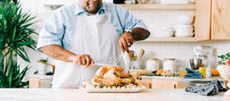 Man Carving the Thanksgiving Turkey  image 1