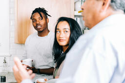 Small Group Members having Conversation in the Kitchen with Coffee  image 2