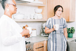 Women having Conversation with Coffee in the Kitchen  image 2