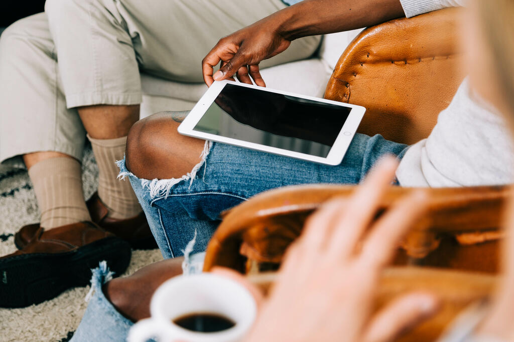 Man Holding iPad at Small Group large preview