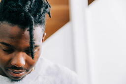 Man with Head Bowed in Prayer  image 1