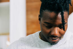 Man with Head Bowed in Prayer  image 2