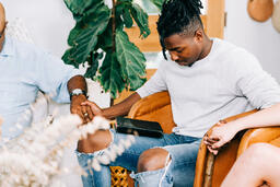 Small Group Members Holding Hands in Prayer  image 2