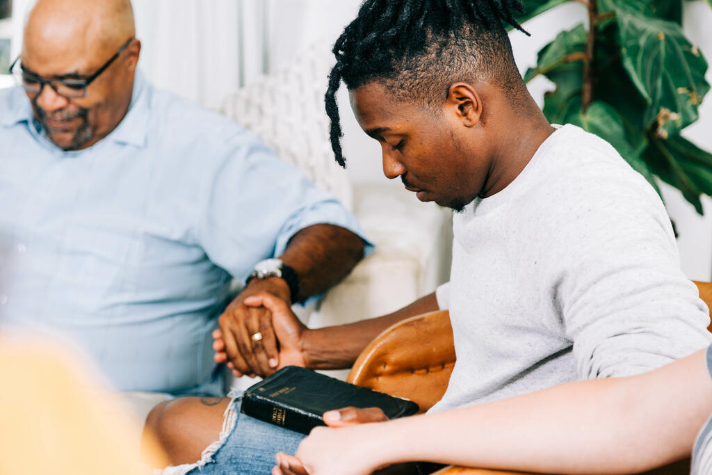 Small Group Members Holding Hands in Prayer large preview