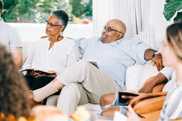 Married Couple Listening during Small Group Discussion  image 1