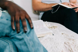 Woman with Open Bible beside her at Small Group  image 1