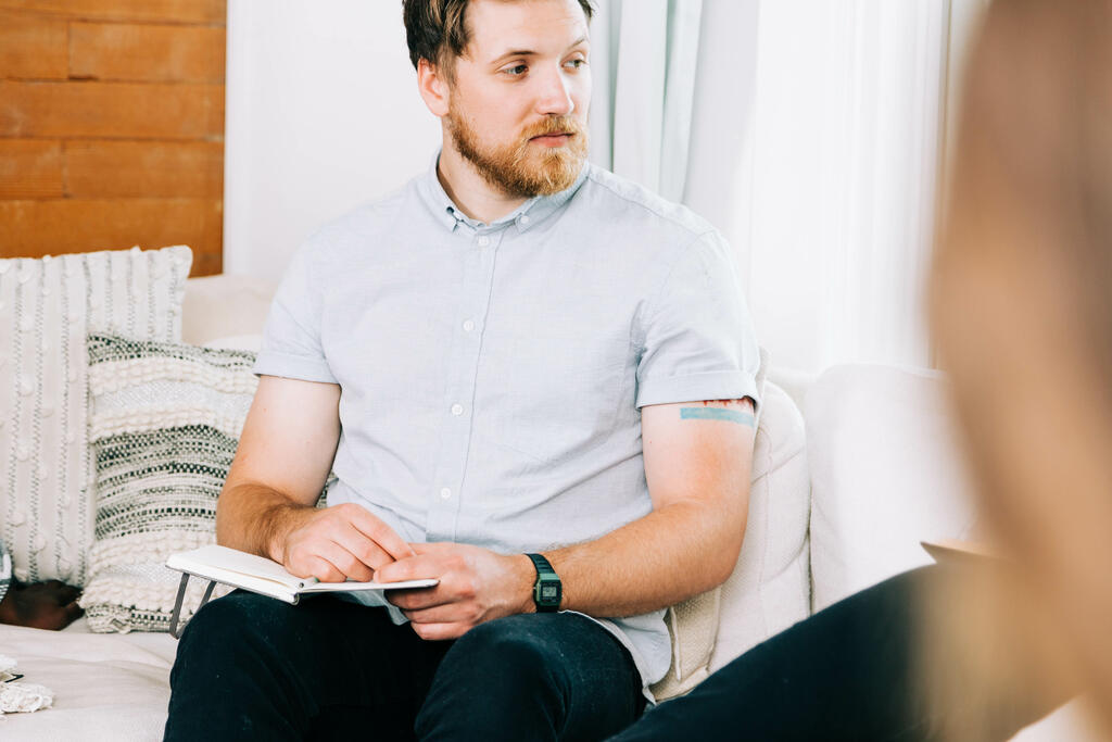 Man Listening during Small Group Discussion large preview