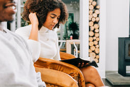 Woman Reading Bible at Small Group  image 1