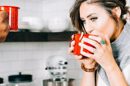 Woman Drinking Hot Cocoa  image 1