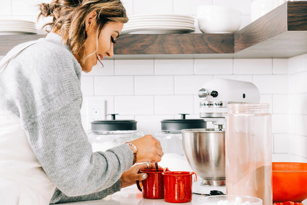 Woman Making Hot Cocoa large preview