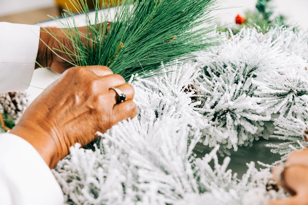 Woman Making a Christmas Wreath large preview