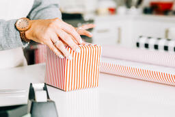 Woman Wrapping a Christmas Present  image 2