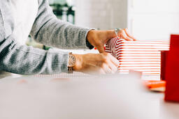 Woman Wrapping a Christmas Present  image 2
