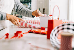 Woman Wrapping a Christmas Present  image 1