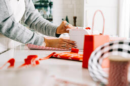 Woman Wrapping a Christmas Present  image 4