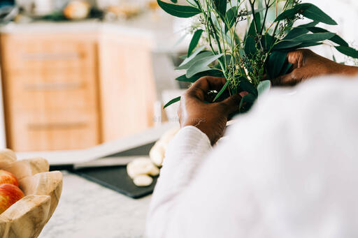 Woman Arranging Thanksgiving Florals