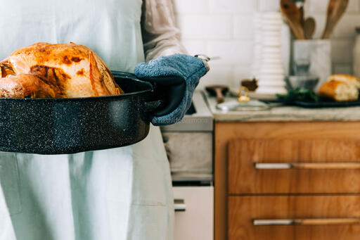 Woman Holding Thanksgiving Turkey