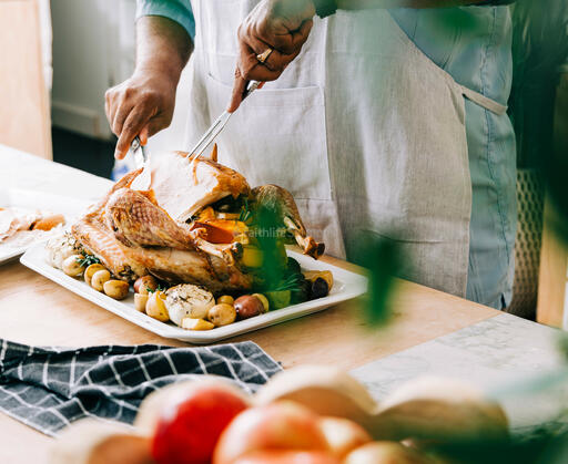 Man Carving the Thanksgiving Turkey