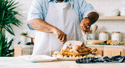 Man Carving the Thanksgiving Turkey