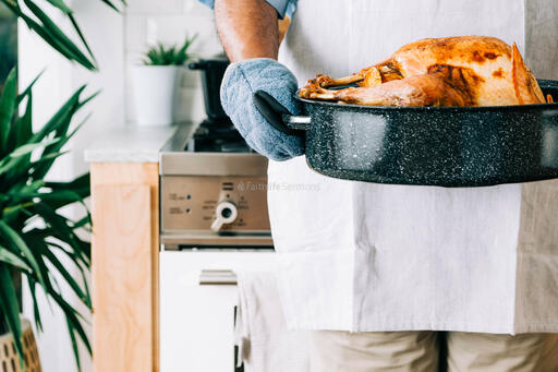 Man Holding Thanksgiving Turkey