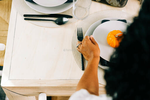 Woman Arrange Thanksgiving Place Setting