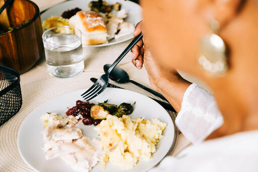 Woman Enjoying the Thanksgiving Meal