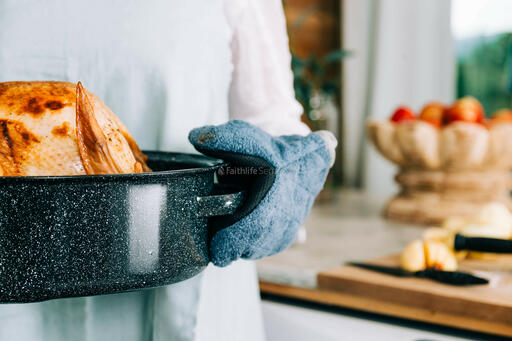 Woman Holding Thanksgiving Turkey