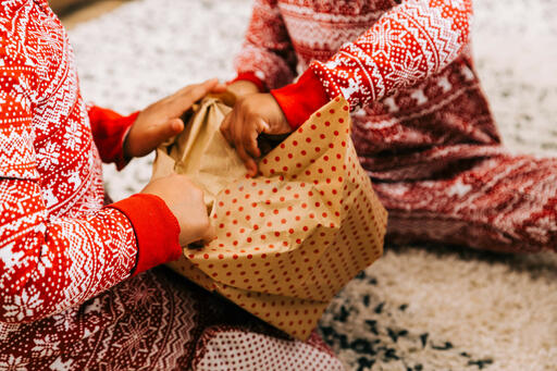 Children Opening Presents on Christmas Morning